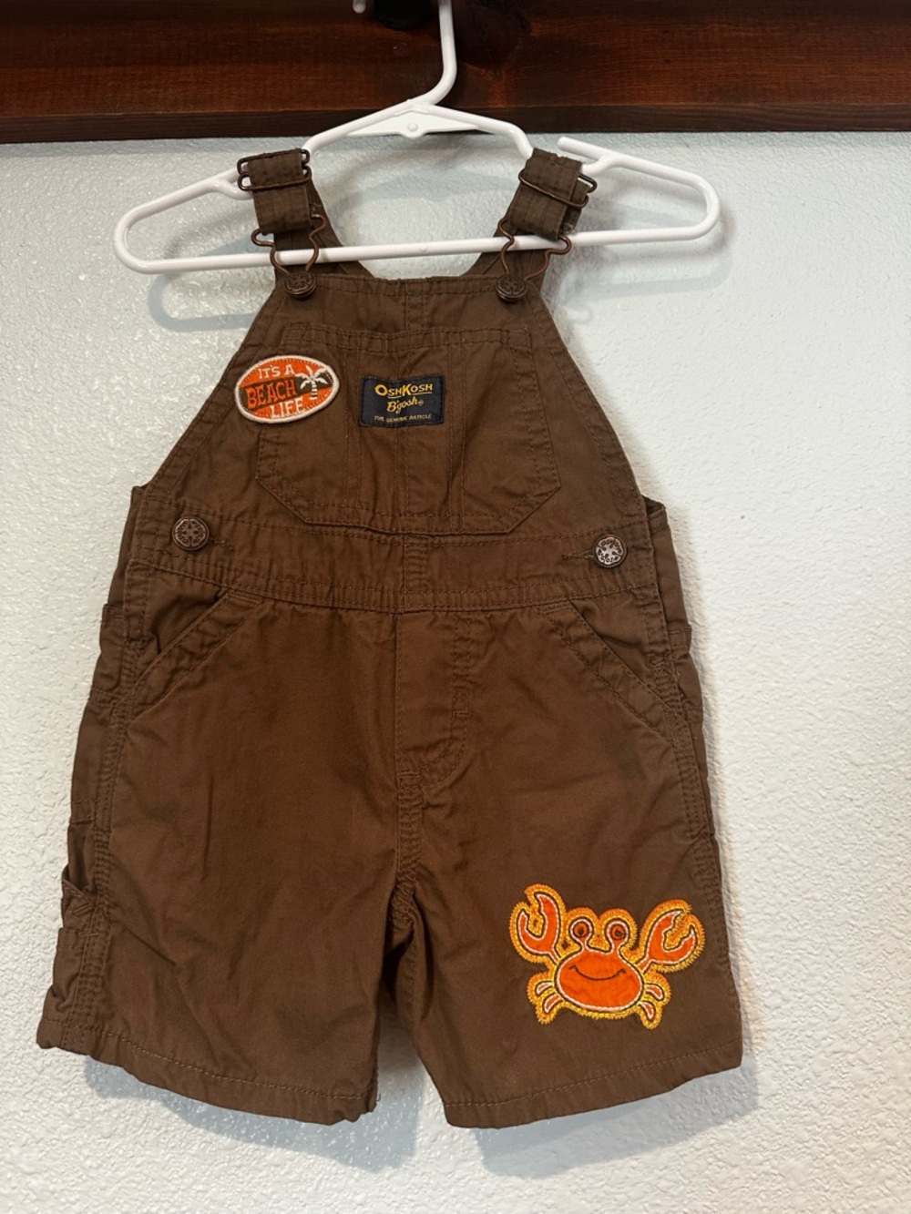 OshKosh B'gosh Baby Boy Brown Shortall with Orange Crab and Beach Patch Size 9M